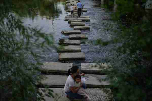 从“掩鼻过”到“乐枕河”：北京一条河的十年之变